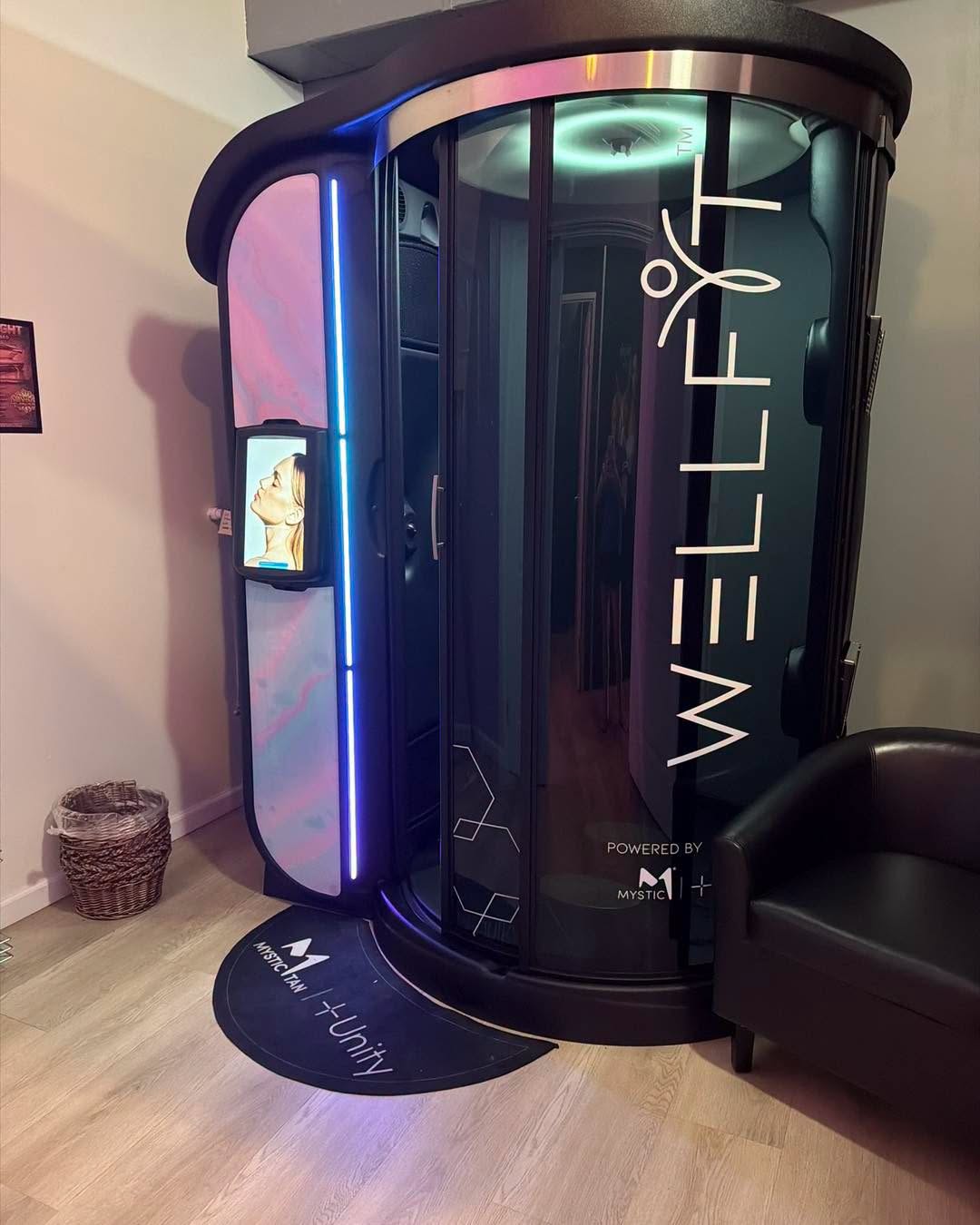 The Mystic WellFit sunless tanning and wellness booth at SunSeekers